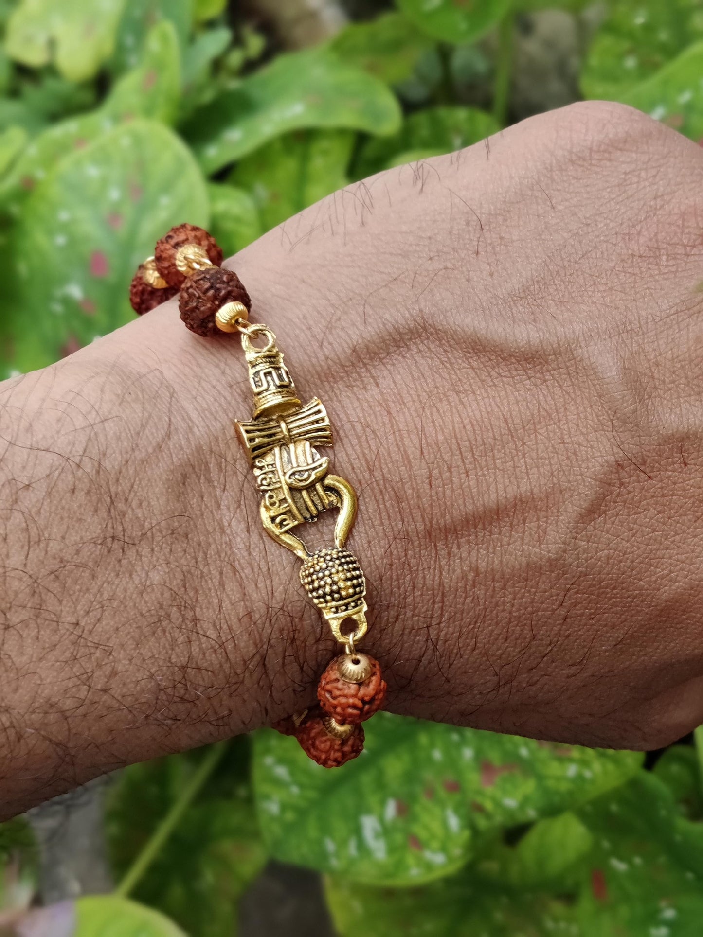 Apnisanskriti Premium Rudrakasha Rakhi Bracelet Golden Cap Mahakal with Damru for Men and Women (Free Size, AAA Quality)